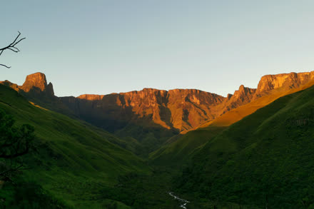 A golden valley in the Drakensberg at first light