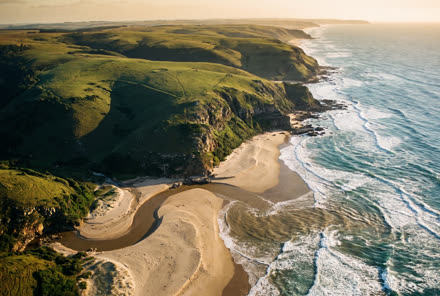 Green hills and a river mouth on the Wild Coast